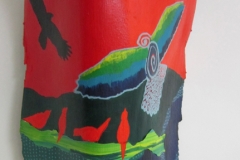 Aviary #11 red backgroundfor green and blue feathered bird with outspread wings painted on queen palm