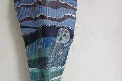 Aviary #14  blue patterning behind blue and black owl painted on queen palm