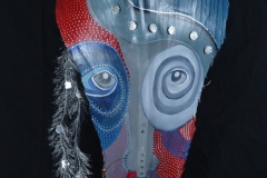 Head of State #10 reds and silvery blue combine to create large eyed face on queen palm
