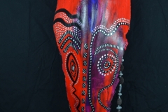 Head of State, #12 mostly red with black, white and blue and blue to create face on queen palm