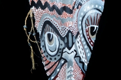 Head of State #6 patterns in silver, red, black and white combine to create face painted on queen palm
