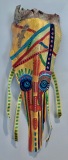 Head of State #19 vibrant blues, yellows, red, green are used to create an elongated image of a persons head, patterns and color blocks Approx. 33"x11"x6"