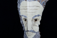 Head of State #5 wise sage face painted on palm frond  shades of black and greys