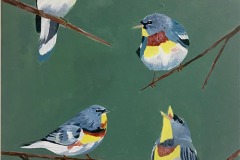 Tweet #21 four small blue birds with a dark band on their white chest perched on branches